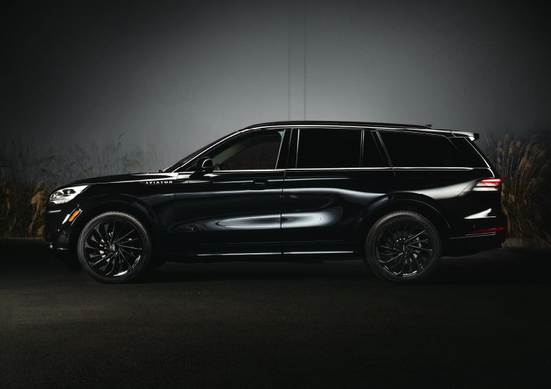 A 2024 Lincoln Aviator® SUV is shown in the Infinite Black exterior color | Magic City Lincoln in Roanoke VA