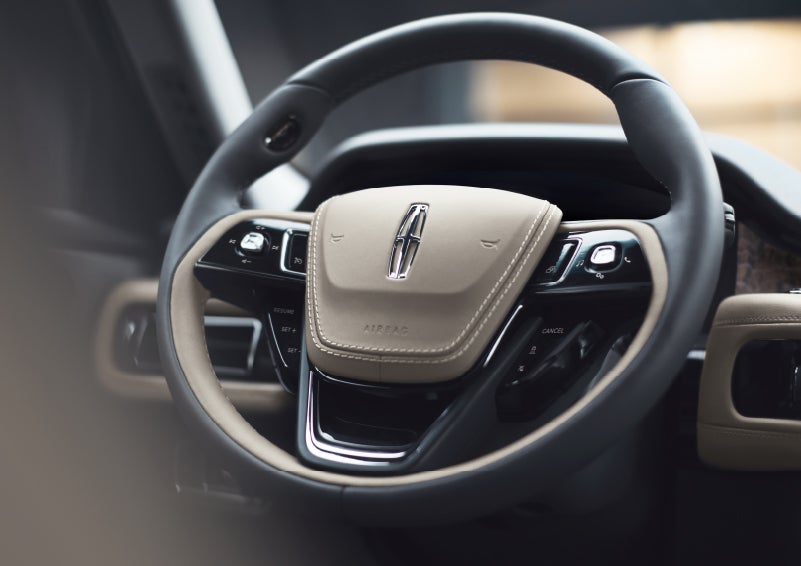 The intuitively placed controls of the steering wheel on a 2024 Lincoln Aviator® SUV | Magic City Lincoln in Roanoke VA