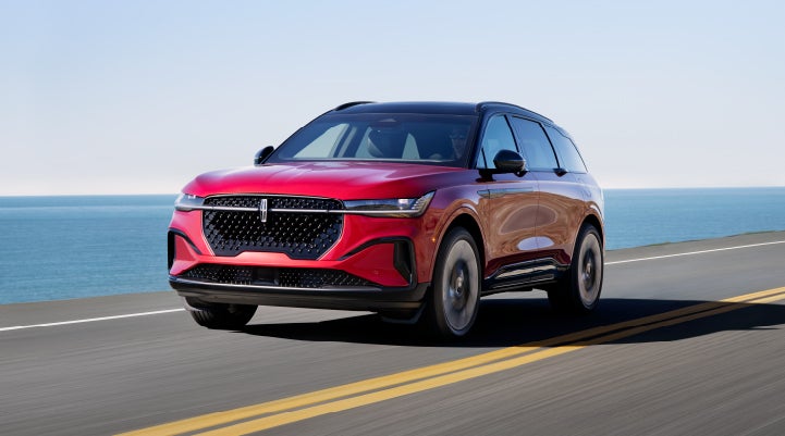 A 2024 Lincoln Nautilus® SUV is being driven on a seaside roadway. | Magic City Lincoln in Roanoke VA