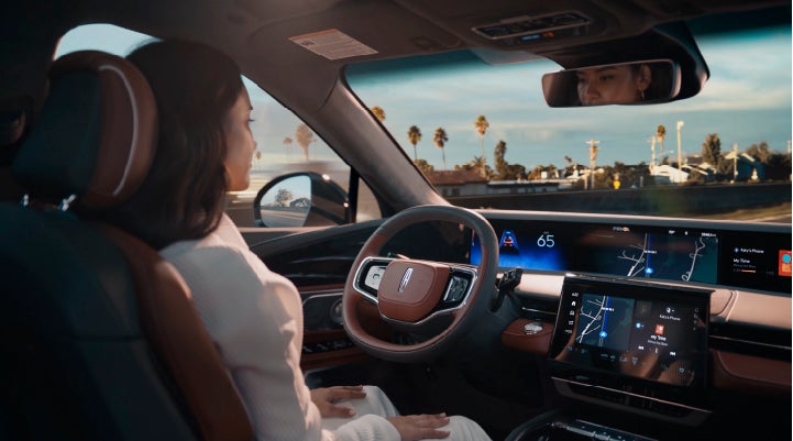 A person is shown driving hands-free on the highway with available Lincoln BlueCruise technology. | Magic City Lincoln in Roanoke VA