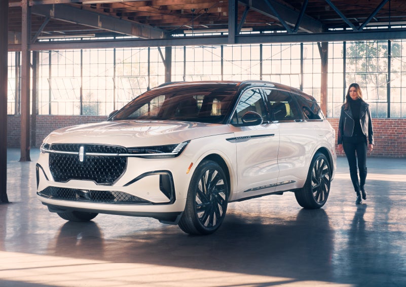 A person approaches a 2024 Lincoln Nautilus® SUV. | Magic City Lincoln in Roanoke VA