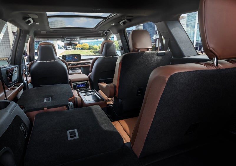 The interior of the 2025 Lincoln Aviator® SUV is shown with two seats folded down for added space. | Magic City Lincoln in Roanoke VA