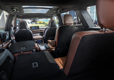 The interior of the 2025 Lincoln Aviator® SUV is shown with two seats folded down for added space. | Magic City Lincoln in Roanoke VA