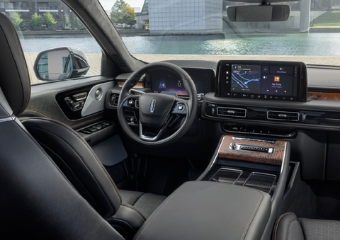 The interior of the 2025 Lincoln Aviator® SUV is shown parked with a view of a harbor through the windshield. | Magic City Lincoln in Roanoke VA