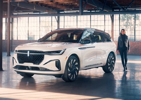 A person approaches a 2025 Lincoln Nautilus® SUV. | Magic City Lincoln in Roanoke VA