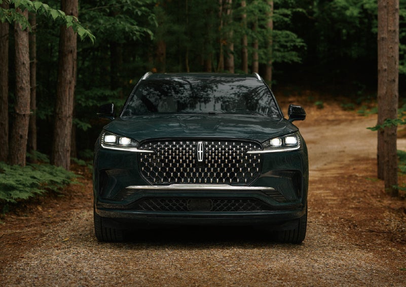 The front grille of a 2027 Lincoln Aviator® Black Label™ SUV is shown. | Magic City Lincoln in Roanoke VA